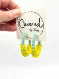 Mint + Yellow Flowers